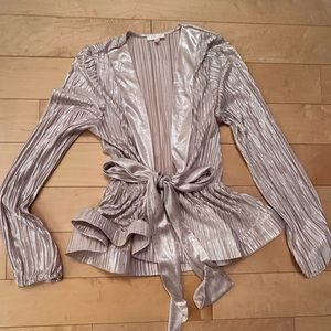 Long sleeve pink metallic shirt.